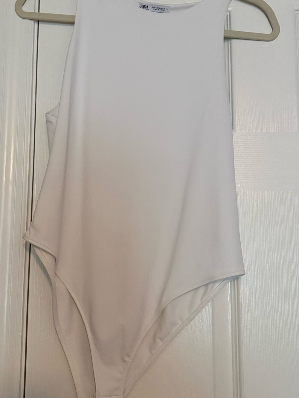 2 Zara High-Neck Sleeveless Bodysuit        (1 White & 1 Purple)